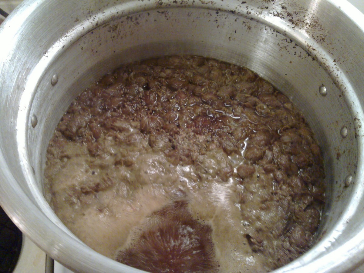 The boil going in the turkey fryer pot